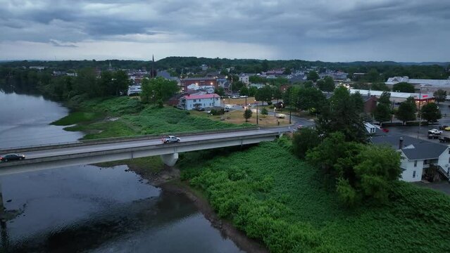 Downtown Milton, Pennsylvania with drone video low, moving up to show downtown.