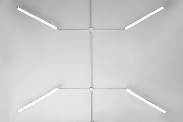 White ceiling with modern lighting in room, bottom view