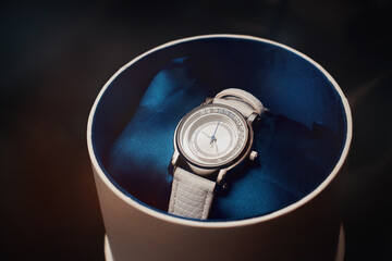 Steel women's watch in a box. A gift to a woman