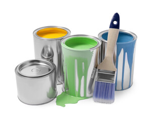 Cans of colorful paints and brush isolated on white