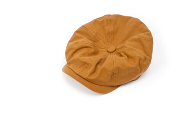 Soft cap of brown color with a visor on a white background.