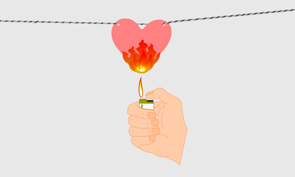 State of mind, love fire burning broken heart. Burning a broken heart from love in the flame from a lighter. 