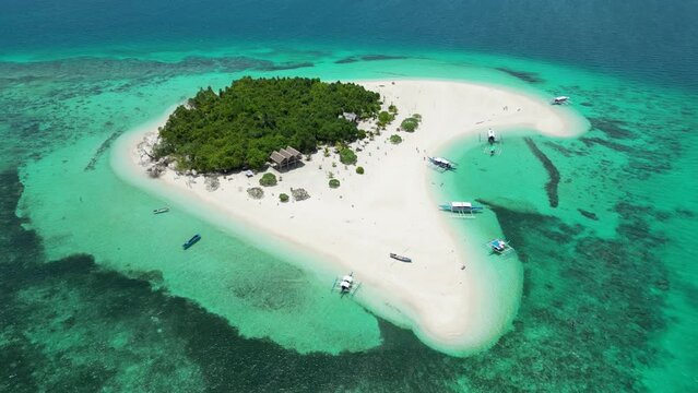 Aerial panoramic overview of reef surrounding patawan island balabac