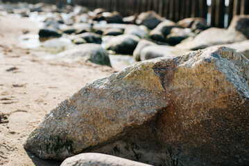 Close-up large texture stone on the beach, cobblestones seashore outdoors
