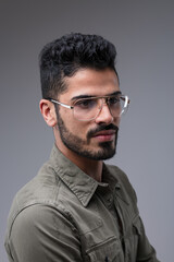 Fototapeta premium Fit Middle Eastern man, serious, three-quarter portrait