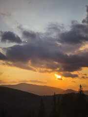 colorful sunset on top of ukrainian mountain