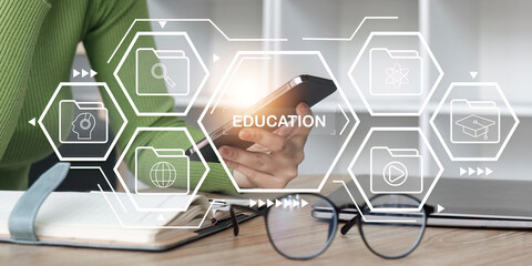 E-Learning concept, Student hand holding a mobile phone and education icon