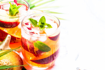Summer drink, iced frui tea. Peach tea. Close up with space for text.