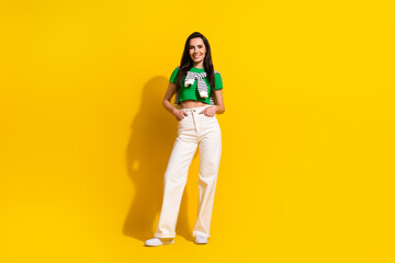 Full length portrait of amazing girl model wear outdoors street clothes go to meet friends isolated yellow color background