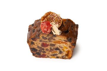 A cake with dried fruits, raisins almonds, dried strawberry.