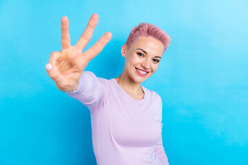 Photo of attractive young girl student counting until three use fingers wear casual trendy outfit...