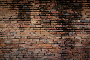 Obraz premium Old brick wall with stains. Dirty brick walls that are not plastered background and texture. Background of old vintage brick walls.