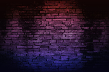 Neon light on brick walls that are not plastered background and texture. Lighting effect red and...