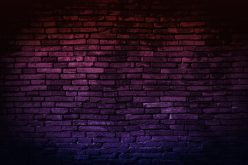 Neon light on brick walls that are not plastered background and texture. Lighting effect red and blue neon background of empty brick basement wall.