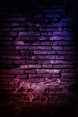 Obraz na płótnie Canvas Neon light on brick walls that are not plastered background and texture. Lighting effect red and blue neon background of empty brick basement wall.