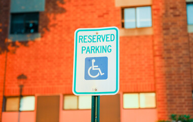 handicap sign represents inclusivity, equal rights, and support for individuals with disabilities. Its blue and white sign denotes accessibility and serves as a reminder to create an inclusive society