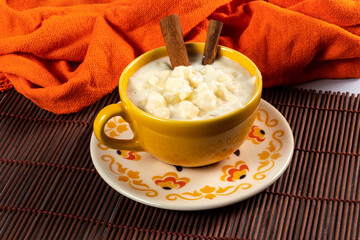 cup of canjica, typical food consumed in the Brazilian Festa Juninas