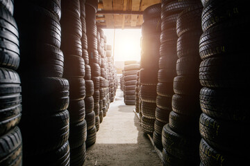 Stack of tires for sale in warehouse © Mulderphoto
