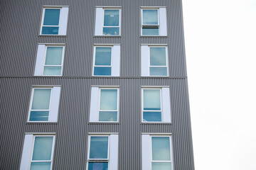 Captivating modern buildings with sleek design and expansive windows, representing progress, transparency, and corporate success