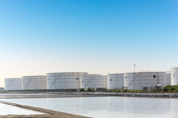 Fototapeta na wymiar Big industrial oil tanks at oil terminal.