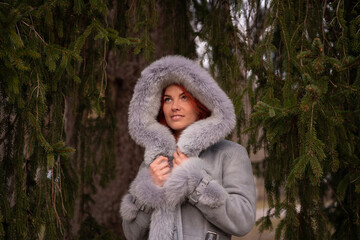 girl wearing a fur hood