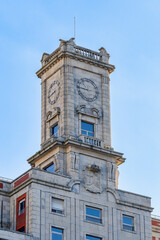 Fototapeta na wymiar Ancient clock tower in Oviedo, Spain