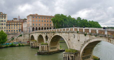 Fototapeta na wymiar Ancient Ponte Sisto bridge standing over Tiber River in Rome, Italy