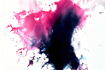Paint drops and splashes on white paper. Multicolored explosion, pink black ink blots abstract background, fluid art