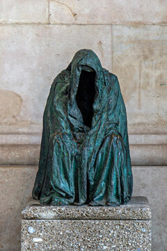 Bronze sculpture by Anna Chromy titled Die Pieta, Coat of Peace, Cloak of Conscience, Salzburg, Austria