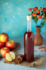 front view apple vinegar with apples on blue background food juice drink color red fruit alcohol wine sour
