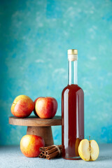 front view apple vinegar with apples on blue background food juice drink red fruit wine sour color
