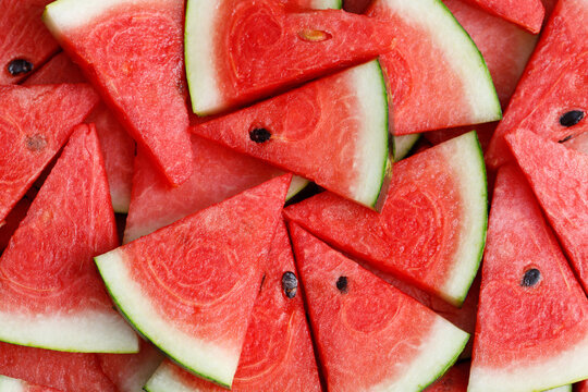 Red watermelon texture background image, rich in nutrients that are beneficial to health.