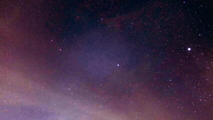 Bright Rising Starry night scene in colorful tropical purple blue sky n universe infinity shiny star field n moving white cloud from planet earth, Stop Motion 4k Glowing MilkyWay Galaxy TimeLapse - Powered by Adobe