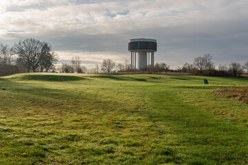 A big and high water tower from concrete, many columns, architecture © Bohdan