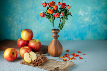 Fototapeta premium front view fresh red apples with flowers on blue background color fruit flower ripe mellow juice