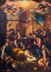 NAPLES, ITALY - APRIL 19, 2023: The painting of  Nativity (Adoration of Shepherds) in the church Chiesa del Gesu Nuovo by Girolamo Imparato (1602).