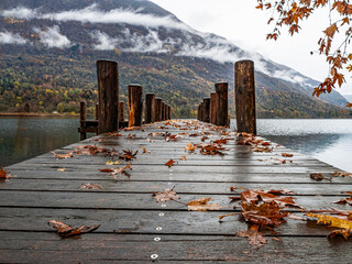 Wood pier on Lake Piano in autumn