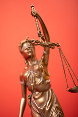 Bronze statue of the Goddess of Justice Themis, holding the Law Scales in her hands,