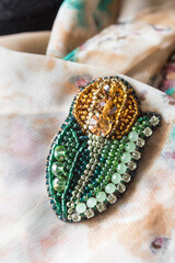 Jewelry is created by hand from beads and natural stones.