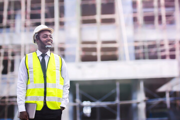 African architects engineer man with tablet work together in the inside the construction building site.Engineering concepts and technological applications.