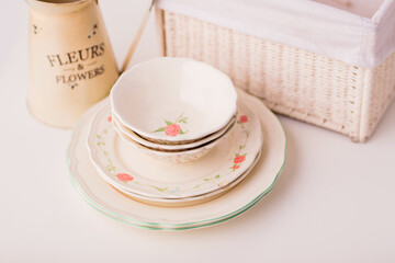 Closeup of porcelain plates and bowls