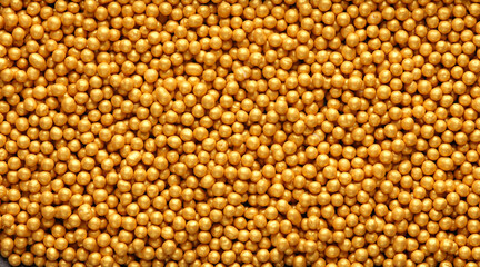 Golden make up powder balls. Beauty concept