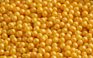 Golden powder balls. Meke up. Beauty concept