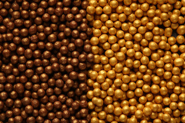 Golden and bronze powder balls. Meke up. Beauty concept