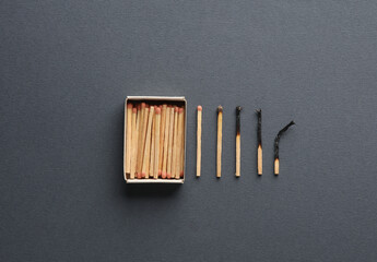 Conceptual photo with burning matches. Burnout, depression, business concept