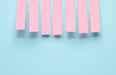 Pink blank note memo stripe stickers on blue pastel background