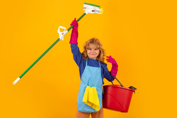 Child mopping house, cleaning home. Detergents and cleaning accessories. Cleaning service. Little boy housekeeping.