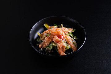 Japanese salad isolated in black background