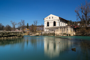 Old abandoned hydro power plant on Vrbas river in Banja Luka, built in 1899