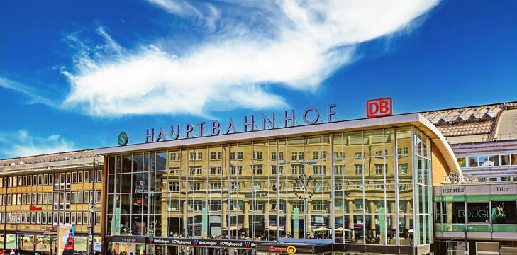 Cologne (K&ouml;ln, Hauptbahnhof), Germany - June 5. 2023: View over busy square on central train station entrance in summer